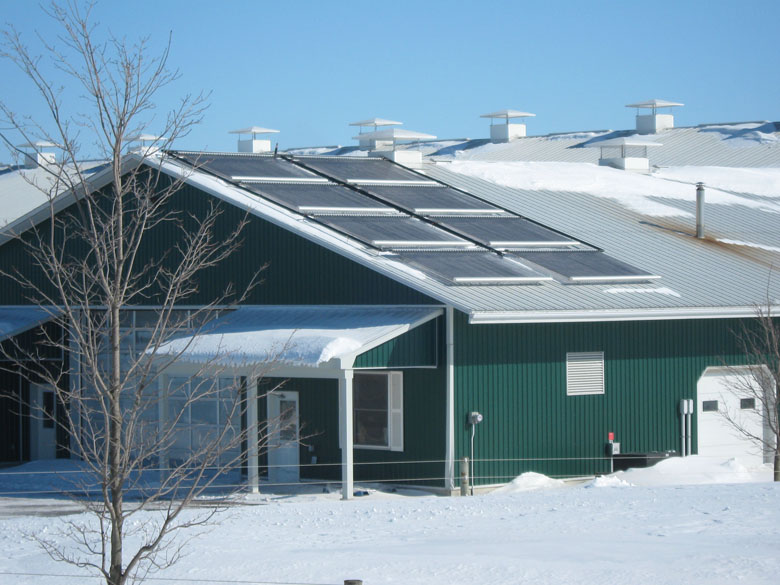 A picture of a solar hot water installation at a dairy farm